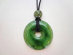 image 0 Jade Necklaces With Faceted Round Beads, Round Jade Necklace With Faceted Beads, Jade Properties, Nephrite Jade, Disc Pendant, Skateboard Art, Rip Curl, Jade Pendant, Gems Jewelry