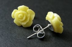 A set of brightly colored banana yellow flower earrings created from delicate resin gardenia flowers that have been set upon silver plated earring posts and come with a set of matching silver plated earring backs.Flower Size: 12mmThese earrings come in a variety of colors! http://etsy.me/1rEclsOStop by and visit http://stumblingonsainthood.etsy.com to see more handmade designs!© Stumbling On Sainthood (StumblingOnSainthood@gmail.com)www.StumblingOnSainthood.comShop Policies - http://etsy.me/1vnT Yellow Jewelry With 3d Flower Details, Yellow Flower-shaped Earrings With 3d Flowers, Yellow Flower Earrings With 3d Flowers, Yellow Earrings With 3d Flowers As A Gift, Yellow Handmade Flower Earrings For Gift, Handmade Yellow Flower Earrings For Gift, Yellow Earrings, Rose Earrings, Handmade Design