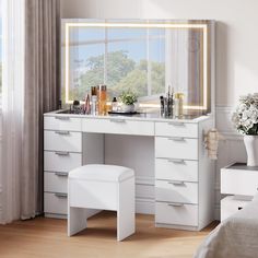 a bedroom with a vanity, stool and large mirror on the wall next to it