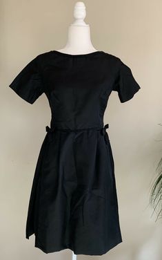 Vintage Galerie Silk A Line dress Black Small Details *A Line *Silk *Unlined *Accent Bows *Box pleats *Short sleeve *Metal *Zipper Excellent condition No flaws Length approx 36” A Line Dress Black, Pleated Shorts, Line Dress, Small Details, Box Pleats, Metal Zipper, Dress Black, A Line Dress, Wrap Dress