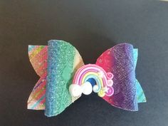 Excited to share the latest addition to my #etsy shop: Beautiful rainbow hair bows https://etsy.me/2Na1wi4 #rainbow #hairbow #vibrant #glitter #vinyl #metalclip #rubber #polyclay #mummybearsparkle Loom Charms, Rainbow Loom Charms, Ribbon Sculpture, Rainbow Loom Bracelets, Ribbon Hair, Boutique Hair Bows, Boutique Bows