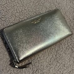 New Without Tags - Never Used In Excellent Condition Elegant Kate Spade Travel Wallet, Elegant Kate Spade Rectangular Wallet, Elegant Silver Bags With Card Slots, Luxury Leather Kate Spade Wallet, Luxury Kate Spade Leather Wallet, Luxury Leather Wallet By Kate Spade, Kate Spade Luxury Wallets, Luxury Everyday Kate Spade Wallets, Luxury Kate Spade Wallet