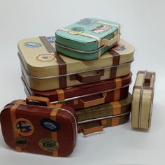 several pieces of luggage stacked on top of each other