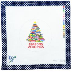 a cross - stitch christmas tree with the words bearing readings on it's side