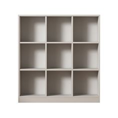 a white bookcase with twelve compartments on each side