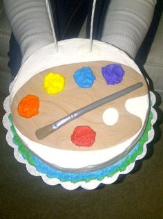 a cake that has been decorated to look like an artist's palette