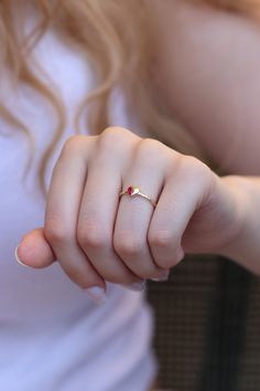 "Handmade Gold Heart With Natural Ruby / 14k 18k Gold Genuine Ruby Ring Available in Gold, Rose Gold and White Gold / July Birthstone ❥ ITEM DETAILS ---> Gold Color of Choice : Yellow Gold, Rose Gold, White Gold ---> Material : 14k ( 585 ) or 18k ( 750 ) Real Gold. It is Not Gold Filled or Gold Plated ---> Made to order ---> Band Thickness : 1.20 mm ---> Band Width : 1.30 mm ---> Ruby Cut: Pear Shape Ruby ---> Number of Stones: 1 Pear Shape Ruby ---> Total Carat : 0.20ct 14k Gold Heart-shaped Proposal Jewelry, Heart-shaped Rose Gold Solitaire Jewelry, Heart Shaped Rose Gold Solitaire Jewelry, Rose Gold Heart Solitaire Jewelry, 14k Gold Heart-shaped Solitaire Ring, 14k Gold Heart-shaped Ruby Promise Ring, Heart-shaped 14k Gold Birthstone Ring, Heart Cut Birthstone Ring In 14k Gold, 14k Gold Solitaire Heart Ring As Gift