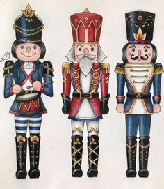 three nutcrackers are standing next to each other