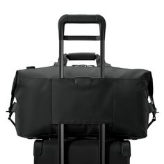 This classic Weekender Duffle is ideal for a long weekend or everyday use. It's sleek and spacious design keeps everything accessible for hassle-free retrieval. Elegant Black Travel Accessories For Everyday Use, Elegant Black Luggage, Classic Black Travel Accessories, Classic Black Travel Accessories For On-the-go, Black Classic Travel Accessories For On-the-go, Weekend Trip, Business Trip, Essential Items, Travel Companion