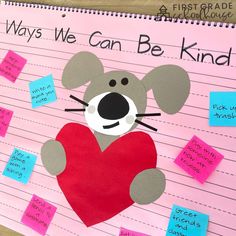 a bulletin board with a mouse holding a heart