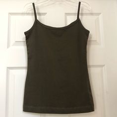 New H&M L.O.G.G. Spaghetti Strap Olive Green Tank Top Cami. Size Small Olive Green Color. Label Of Graded Goods Made By H&M. Authentic Construction For Timeless Apparel. Features: Scoop Neckline Sleeveless Fitted Stretchable 94% Cotton & 6% Spandex. Made In Bangladesh. Brand New In Excellent Condition. From A Clean, Smoke Free And Pet Free Home. Also Available In Pink, Purple Or Burgundy Colors; Sold Separately. Tyler Concert, Black Mock Neck Top, Olive Green Tank Top, Olive Tank Top, Green Cami, Girly Clothes, White Crop Top Tank, Black Corset Top, Long Tank Tops