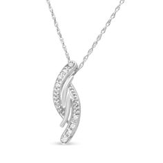 Simple in design and classy by look, this diamond pendant is composed of alluring sterling silver. The intriguing neckpiece is embellished with shimmering round cut diamonds. Polished high to shine with grace, the pendant will look even more attractive when dangles from the matching chain. This piece comes with a sterling silver 18" inch box chain that fastens with a spring ring mechanism. Fine Jewelry Diamond White Channel Set Necklace, Fine Jewelry White Necklace Channel Set, Diamond White Channel Set Necklace, Elegant Sterling Silver Necklace With Channel Set, White Channel Set Fine Jewelry Necklace, Diamond White Channel Set Diamond Necklace, Channel Set Ruby Elegant Anniversary Necklace, Diamond White Channel Set Necklace For Formal Occasions, White Diamond Channel Set Necklace