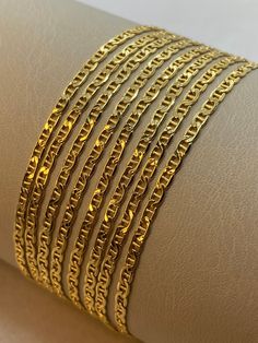 "2.5MM 18k Real Gold anchor chain, 20\" inches ,2.5mm ,a bout 3.34 gr 18k Real Gold anchor chain, 18\" inches ,2.5mm ,a bout 2.95gr 18k Real Gold anchor chain, 17\" inches ,2.5mm ,a bout 2.81 gr 18k Real Gold anchor chain, 16\" inches ,2.5mm ,a bout 2.60gr [Please text me if you want specific length or width ,i can customize it for you.] ANCHOR CHAIN: Is characterized by uniformly sized repeating oval links which are arranged alternatively in a horizontal and then vertical orientation, tradition 22k Gold Figaro Chain Necklace As Gift, Real Gold Chains, Anchor Chain, Vertical Bar, Necklace For Her, Gold Flats, Text Me, Real Gold, Shopping Cart