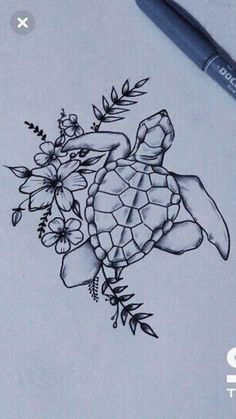 a drawing of a turtle with flowers on it