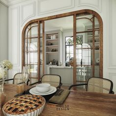 a dining room table with a pie on it