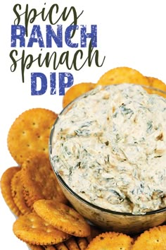 spinach dip in a bowl surrounded by crackers on a white background with the words spicy ranch dip above it