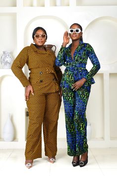 The Yinka African Print pantsuit is sure to turn heads and make you feel like the smart money woman that you are. This pantsuit has a stunning tailored design with double lapel and a chic buckled belt along with that gorgeous print and pattern, exuding an air of elegance and sophistication. Style her with heels, a cute purse and accessories and you are good to go! JACKET Double lapel Pocket details Matching detachable buckled belt Full length Long sleeved Fully lined Length 27" 100% cotton PANTS Smart Money Woman, Eclectic Style Clothing, Money Woman, Print And Pattern, Woman In Suit, 2piece Outfits, Application Icon, Coat Suit, Types Of Lace