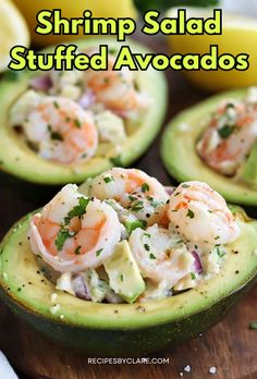 shrimp salad stuffed avocados on a cutting board