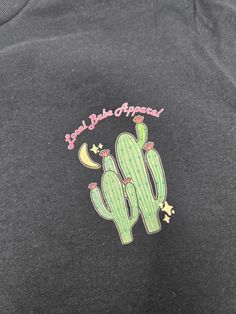 Get ready to rock your retro style with our Actin'Up Cactus T-shirt! Made from soft cotton in a unisex fit, this tee features a playful cactus design that will make you stand out from the crowd. Look cool and feel comfortable in this must-have addition to your wardrobe. Cactus Tshirt, Cactus Design, Stand Out From The Crowd, Look Cool, Get Ready, Retro Style, Retro Fashion, Cactus, Make It Yourself