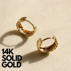 14K Gold Bold Huggie Hoop Earrings FEATURES: -Gold KT: 14K Solid Gold -Gold Color: Yellow Gold, White Gold -Closure: Hinged Snap Back -Diameter: 11.5 mm -Thickness: 3mm -Sold as a pair SHIPPING: -Ready to Ship in 1-2 Business Days -FREE shipping on all U.S. orders  -Packed in a labeled gift box -The perfect birthday or holiday (Christmas, Hanukah, valentines day...etc.) gift!  -We ship globally RETURNS: -Easy 30 Day Return Policy CONTACT US: -Contact us with any inquiries by Etsy convo :   MY SH Cheap Metal Huggie Earrings For Gift, Luxury Brass Huggie Earrings As Gift, Affordable Adjustable Modern Huggie Earrings, 14k Yellow Gold Huggie Hoop Earrings, 14k Gold Huggie Earrings With Lever Back, 14k Gold Stamped Huggie Earrings Gift, Yellow Gold 14k Huggie Hoop Earrings, 14k Gold Huggie Hoop Earrings Gift, 14k Gold Hoop Earrings With Lever Back