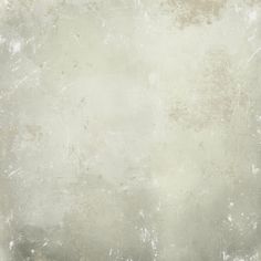 an old grungy background with white and gray paint on the bottom right corner