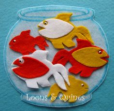 four goldfish in a fish bowl on a blue background with the words loops & quines