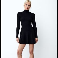 Worn Once, Looks Brand New! Makes A Great Date Night Look. Elegant Turtleneck Ribbed Mini Dress, Elegant Ribbed Turtleneck Mini Dress, Black Ribbed Stretch Mini Dress, Chic Winter Mini Dress With Stretch, Casual Black Sweater Dress For Party, Black Fit And Flare Long Sleeve Mini Dress, Black Fitted Mini Sweater Dress, Fitted Black Mini Sweater Dress, Casual High Neck Sweater Dress For Night Out