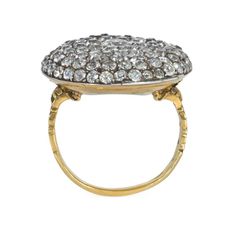 For Sale on 1stDibs - A Georgian pavé diamond ring of circular design with shoulders of open scrollwork, in 18k gold. Center diamond approximately 4.7 mm in diameter. Face-up Pave Diamond Ring, Circular Design, Cluster Ring, Pave Diamonds, Diamond Ring, Period, 18k Gold, Carving, Ring