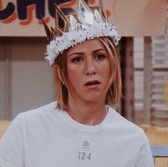 a woman wearing a crown on top of her head