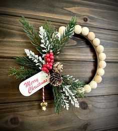 a christmas wreath hanging on a wooden wall