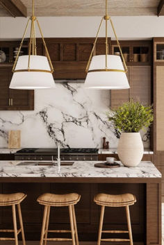 A Pair of Oliver Pendants are installed in Aged Gold over a kitchen island with warm earth tones. Alora Lighting, Lights Over Island, Lights Over Kitchen Island, Gold Pendant Lighting, Large Pendant Lighting, Island Pendant Lights, Kitchen Island Lighting Pendant, Cozy Ambiance, Island Pendants