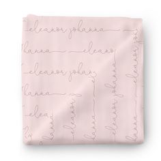 a pink sheet with writing on it