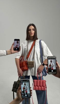 three people holding up cell phones in front of each other with multiple images on them