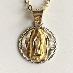 "14K SOLID GOLD GUADALUPE NECKLACE .REAL 14K GOLD (NOT PLATED OR FILLED) 18\" LONG 14K GOLD CHAIN WITH 14K GOLD GUADALUPE PENDANT . --1.7 GR -. FOR GOOD LUCK,PROTECTION,HEALTH AND ANY KIND DIFFICULTY. PENDANT SIZE : 20x13mm ---MADE IN ITALY-BEST QUALITY--- FREE GIFT BOX NOTE:THIS ITEM IS SHIPPED WITH SIGNATURE CONFIRMATION. CADENA DE GUADALUPE EN ORO PURO 14K . 18\" LARGO CADENA ORO 14K .14K ORO DIJE DE GUADALUPE . -- 1.7 GR-- PARA PROTECCION ,BUENA SUERTE ,SALUD Y PARA CUALQUIER CASO DIFICIL. D Oval Yellow Gold Jewelry With Our Lady Of Guadalupe, Gold Virgencita Necklace, Gold Our Lady Of Guadalupe Necklace Gift, Spiritual Yellow Gold Our Lady Of Guadalupe Jewelry, Gold Our Lady Of Guadalupe Pendant Necklace, Good Luck Bracelet, Evil Eye Pendant, Good Luck, Dainty Necklace