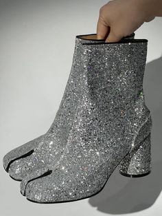 Step out in style with these Wallon Tabi Toe Sequin Boots! Crafted from supple sequin, with a modern tabi toe design, these boots will take your look from drab to fab. Elevate any outfit with these timeless, stylish boots, perfect for any season! Fur Aesthetic, Nails Necklace, Tabi Boots, Sequin Boots, Shapewear Tops, Casual Evening, Stylish Boots, Jumpsuits And Romper, Feather Dress