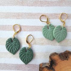 Adorn your ears with the lush beauty of Philodendron Dangle Earrings, perfect for those who cherish botanical-inspired accessories. These customizable Leaf Plant Earrings make an exquisite gift idea, adding a touch of greenery to any plant lover's decor and wardrobe. ● Can be customized to suite your style.  ● Polymer clay = lightweight for all-day comfort.  ● Stainless steel hardware. ● Slight variations may occur as they are handmade. For sneak peaks of new designs or for when we are having a Green Nature-inspired Everyday Earrings, Everyday Green Nature-inspired Earrings, Green Leaf-shaped Earrings As A Gift, Green Leaf-shaped Earrings For Gift, The Roommate, Leaf Jewellery, Green Earring, Plant Earrings, Elegant Gift Wrapping