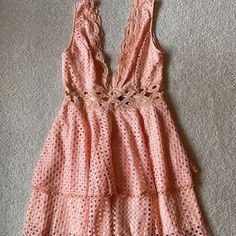 -Never Worn, Tags Still Attached -Super Pretty Pink/Peach Lace Detailing -Zipper Closure In Back -Peach Underskirt Layer -Misdsection See Though Lace -The Lace Looks Slightly Discolored In The Picture But It Matches The Rest Of The Dress In Person! Apricot V-neck Mini Dress For Summer, Summer V-neck Mini Dress In Apricot, Summer V-neck Apricot Mini Dress, Sleeveless Peach Mini Dress For Day Out, Spring Apricot V-neck Mini Dress, Peach V-neck Mini Dress For Beach, Feminine Peach Mini Dress For Vacation, Peach V-neck Summer Dress, Flowy Lace Dress