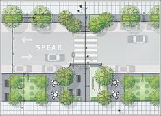 an overhead view of a street with cars and trees