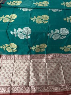 Soft Silk  Saree/Light Dark Leaf Green Color Saree/Floral Design Butta Saree/ Border Less Saree / Light weight/South Indian Saree DETAILS:  Includes One Saree with Blouse pice  Fall: not included Saree Edges: unfinished Material Excluding Design: Soft  silk Saree  Saree weight: 1.166lb (529 g) Saree Dimensions: 218 inches (5.5 meters) long. 47 inches (1.2 meters)  Blouse Piece Attached   Saree color: Green  Pallu color: Pink Maroon  Border color: No Border  Blouse piece color: Maroon Color PRODU Green Anarkali With Block Print, Green Block Print Anarkali Traditional Wear, Green Anarkali Traditional Wear With Block Print, Traditional Block Print Lehenga For Eid, Traditional Green Salwar Kameez With Block Print, Green Block Print Traditional Wear For Eid, Green Block Print Traditional Wear For Diwali, Green Block Print Salwar Kameez For Diwali, Green Traditional Wear With Block Print For Diwali