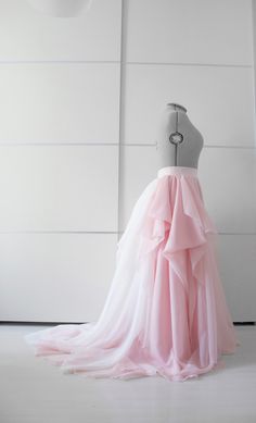 Absolutely gorgeous full layered draped wedding skirt in blush pink color and beautiful ivory train! Perfect choice for your special day or photo session. I can make it all colors! What you have to send when you place an order: 1. Waist round measurement (cm or inch) This is thinnest part over belly button. 2. Straight line from waist to floor. This is not skirt length. 3. If you want to change the color. 4 Phone number for delivery. NOTE: Real colors can't be 100% same as the pics because of ca Elegant Wedding Maxi Skirt With Ruffles, Pink Tulle Skirt Gown For Wedding, Elegant Ruffled Maxi Skirt For Wedding, Elegant Pink Tiered Maxi Skirt, Pink Tulle Skirt For Wedding, Elegant Pink Tulle Wedding Dress, Elegant Ruffled Tulle Fabric For Wedding, Elegant Wedding Tulle Fabric With Ruffled Skirt, Wedding Long Ruffled Tulle Skirt