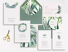 wedding stationery with tropical leaves and greenery on the front, in shades of green