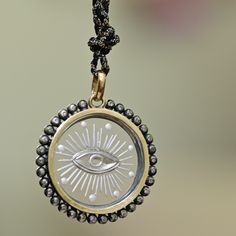 Materials: 10K Gold, Sterling Silver, Diamonds, Carved Quartz Pendant Dimensions: Diameter 33mm, Depth 5mm Necklace Length: Adjustable Evil Eye Necklace, Quartz Pendant, Eye Necklace, Silver Diamonds, Necklace Length, 10k Gold, Evil Eye, Necklace Lengths, Diamonds