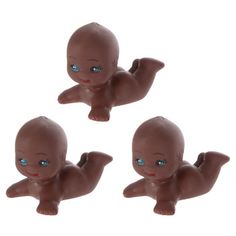 three little baby dolls with blue eyes are shown