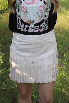 This sassy little number is made of cream fringe that swirls and twirls every time you move. Don't be shy — unleash your inner wild thing! This skirt has shorts and a side zipper. This skirt is running true to size with some stretch. Model is wearing a size SMALL.Model is 5 ft. 3 in. - 125ish lbs. Model typically wears small/medium in tops. Denim Jogger Pants, Solid Sweaters, Fringe Skirt, Denim Joggers, Weekly Outfits, Single Women, Jogger Pants, Pullover Hoodie, Long Sleeve Tops