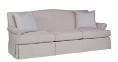 a white couch with two pillows on it's back and the seat upholstered