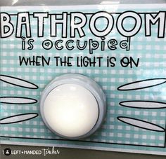 a bathroom sign with the words, bathroom is occupied when the light is on in black and white