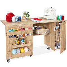 a sewing table with crafting supplies on it