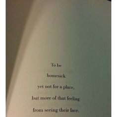 an open book with the words to be homesick yet not for a place, but more of that feeling from seeing their face