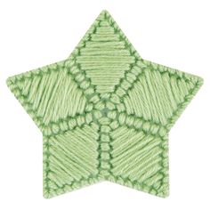 a green and white star shaped ornament