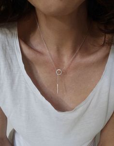 This Lariat necklace is totally handmade made from sterling silver. A dainty necklace that adjusts to any outfit. Great layering charm necklace, easy to wear on its own too. The diameter of the circle is 12 mm and the bar is 20 mm long. Length: 52 cm -----> 20 inches 62 cm -----> 24 inches 72 cm -----> 28 inches Feel free to ask for a different length. The necklace above is not the exact one you will receive. Each one is handmade to order and may slightly vary from the pictures. Please Circle Bar, Eternity Necklace, Stacked Necklaces, Y Necklace, Silver Chain Style, Mismatched Earrings, Lariat Necklace, Minimalist Necklace, Necklace Sterling Silver